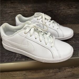 Nike White Low Top Sneakers with Light Blue Accent